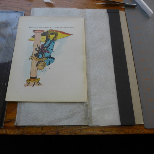 Step four: lift the buckram and return it to its original positions, and-voila!-your folio or signature has an unwrinkled, completely flat guard. Trim height to size when dry.